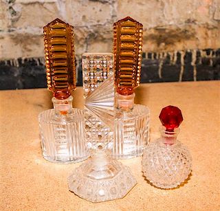 Four Cut Glass Perfumes Height of pair 7 inches.