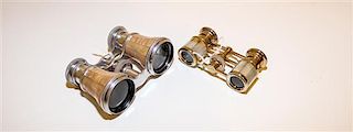 Two Pairs of French Mother-of-Pearl Veneered Opera Glasses Width of widest 4 1/4 inches.