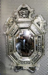 * A Venetian Mirror. Length overall 45 inches.