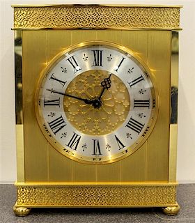 A Swiss Brass Bracket Clock. Height 10 /14 inches.