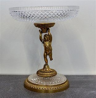 A Continental Gilt Metal Mounted Cut Glass Figural Tazza. Height 11 1/4 inches.