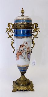 * A Sevres Style Porcelain Urn. Height 19 1/2 inches.