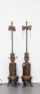 * A Pair of Neoclassical Bronze Oil Lamp Bases Height overall 33 1/4 inches.