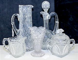 * A Collection of Cut Glass Serving Articles Height of tallest 10 1/2 inches.