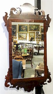 * A Chippendale Style Mahogany Mirror Height 35 1/2 x width 19 1/2 inches.