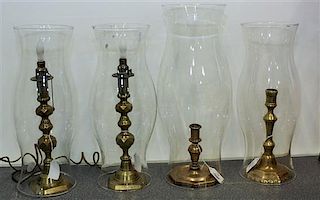 * Two Pairs of Brass Candlesticks Height of taller pair 9 3/4 inches.