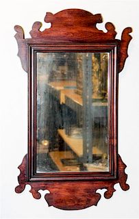 * A Chippendale Style Mahogany Mirror Height 26 x width 15 1/4 inches.