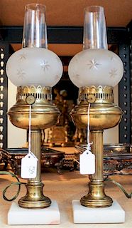 * A Pair of American Brass, Marble and Glass Fluid Lamps Height 16 3/4 inches.
