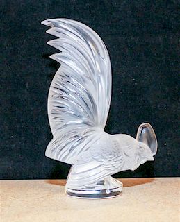 * A Lalique Molded and Frosted Glass Mascot Height 8 1/4 inches.