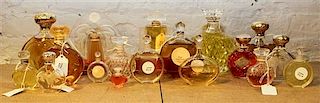 * A Collection of Eighteen Lalique and Other French Glass Perfume Bottles. Height of tallest 6 1/2 inches.