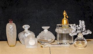 * Seven French Molded and Frosted Glass Perfume Articles Height of atomizer 6 3/4 inches.
