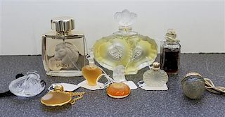 * Nine Lalique and Other Perfume Bottles. Height of tallest 4 inches.