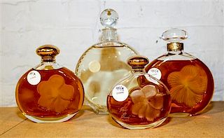 * Four Large French Glass Perfume Bottles. Height of tallest 8 1/2 inches.