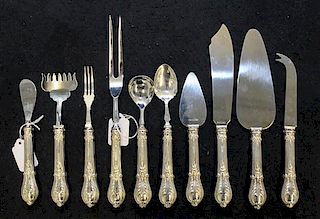 A Set of Ten Silver Handled Serving Articles, , comprising a cake slice, master butter knife, sugar scoop, bar knife, pickle 