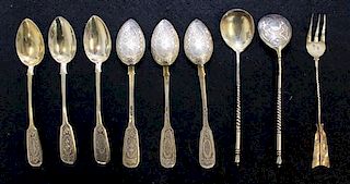 A Group of Eight Russian Gilt-Silver Teaspoons, various makers, comprising six Fiddle form teaspoons with the mark of Prokopy
