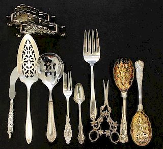 A Collection of Silver-Plate Serving Articles Length of longest 13 1/2 inches.