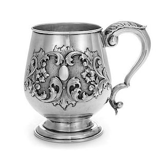 * An Italian Silver Handled Cup, , raised on stepped foot, with applied foliate motif on front, and acanthus handle, marked "