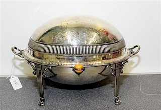 An American Silver-Plate Bacon Warmer. Height 8 1/4 x length 13 1/2 x width 8 inches.