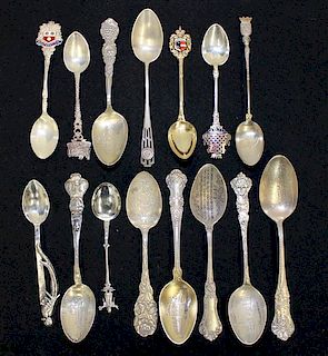 A Collection of Fifteen Silver Souvenir Spoons Length of longest 5 3/4 inches.