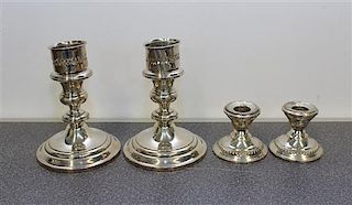 A Pair of American Silver Candlesticks, Gorham Height of first pair 6 inches.