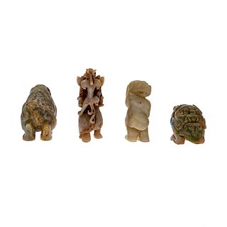 Four Archaic Form Jadeite Figures