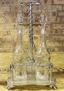 A Silver-Plate Decanter Set. Height of 20 inches.
