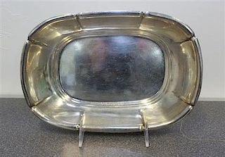 An American Silver Dish, Reed & Barton, Taunton, MA, having an undulating rim with a fluted body and banded base.