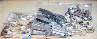 A Collection of American Flatware, various makers and patterns, comprising: 237 dinner knives 52 dinner forks 33 salad forks 