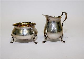 * A Silver Creamer and Sugar Set Height of taller 3 inches.