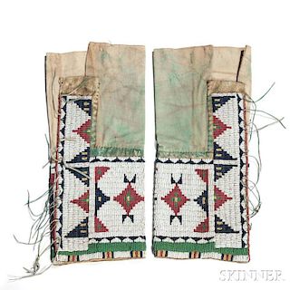 Pair of Arapaho Woman's Beaded Hide and Cloth Leggings