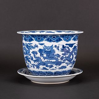 A CHINESE 'DRAGON' BLUE AND WHITE FLOWER POT WITH UNDERCARRIGE PLATE