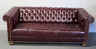 Leather Chesterfield Sofa Raised on Bunn Feet.
