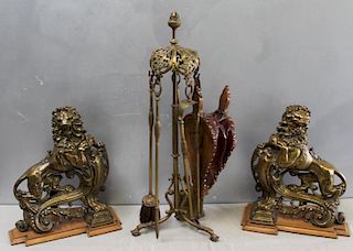 A Pair of large Gilt Metal Lion Form Andirons.