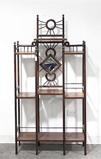 A Victorian Walnut Etagere, Height 61 1/4 inches.