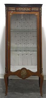 A Louis XVI Style Gilt Metal Mounted Vitrine, Height 63 3/8 x width 28 1/4 x depth 16 inches.