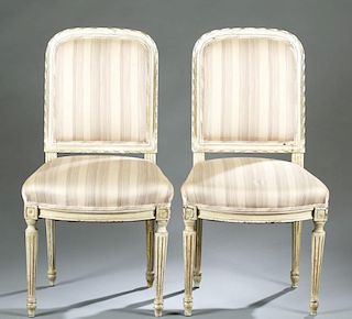 Pair of cream painted French side chairs.