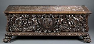 Heavily carved Baroque style oak cassone.