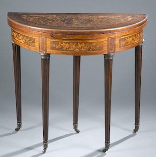 Dutch marquetry demi-lune flip top game table.