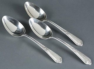 3 Towle Sterling serving spoons.
