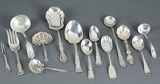 14 Sterling serving spoons & forks, inc. coin.