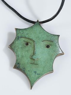 Jean Cocteau enamel on bronze pendant.