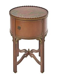 An American Lacquered Side Table, Height 25 1/4 x diameter 18 inches.