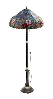 A Leaded Glass Floor Lamp, Height overall 68 inches.