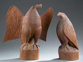 Pair of Henry Winter solid walnut carved eagles.