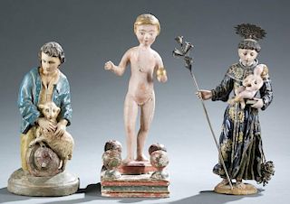 Group of 3 polychrome Santos style figures.