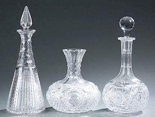 3 brilliant cut glass decanters.