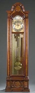 Herschede burled walnut tall case clock.