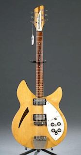 A Rickenbacker 330 Mapleglo electric guitar.