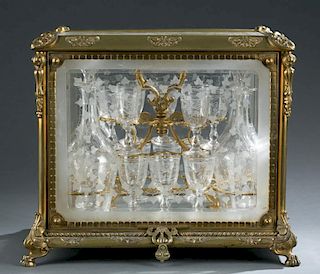 Crystal and bronze etched tantalus with cordials.