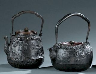 Group of 2 Japanese iron teapots.